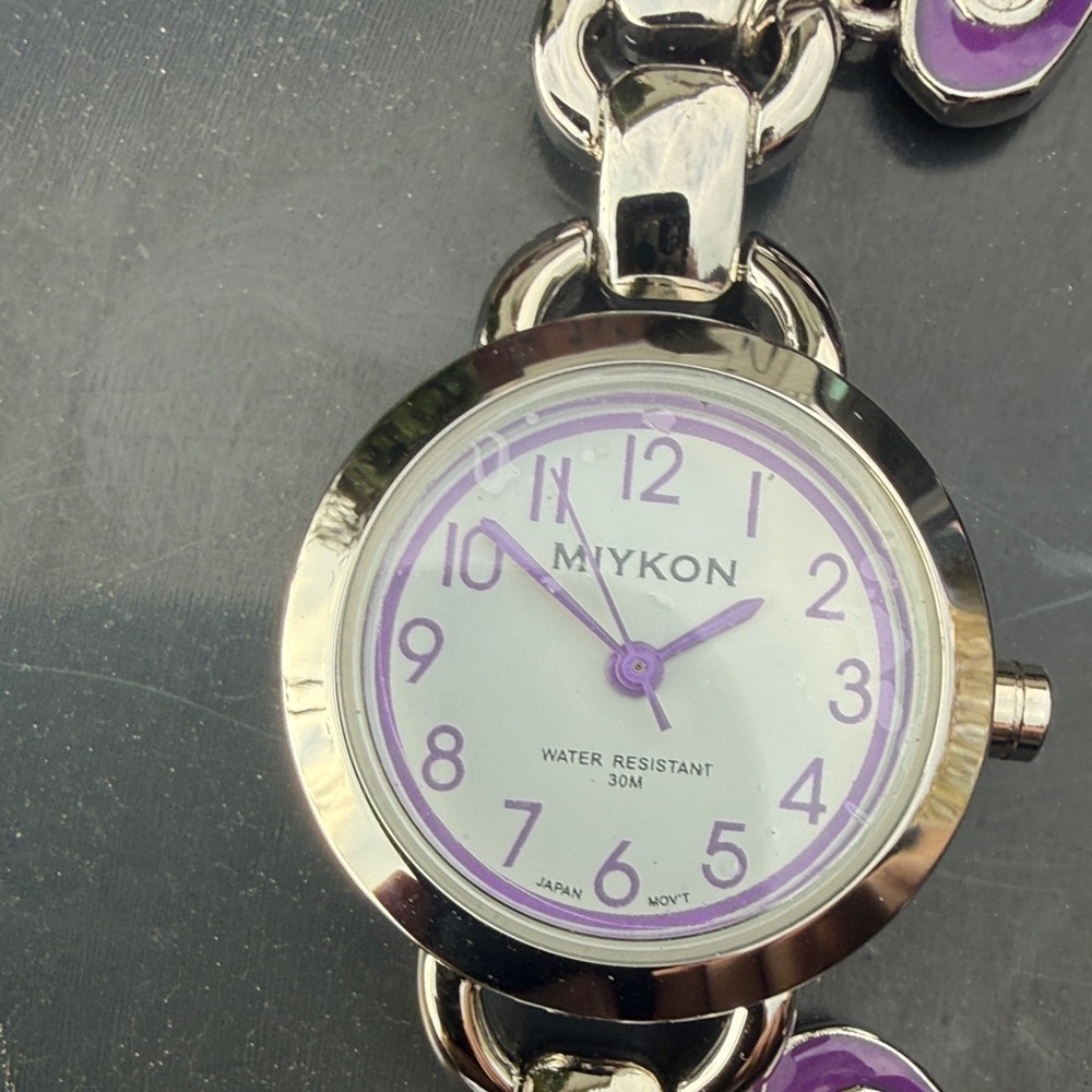 #103 Women's Silver and Purple Watch